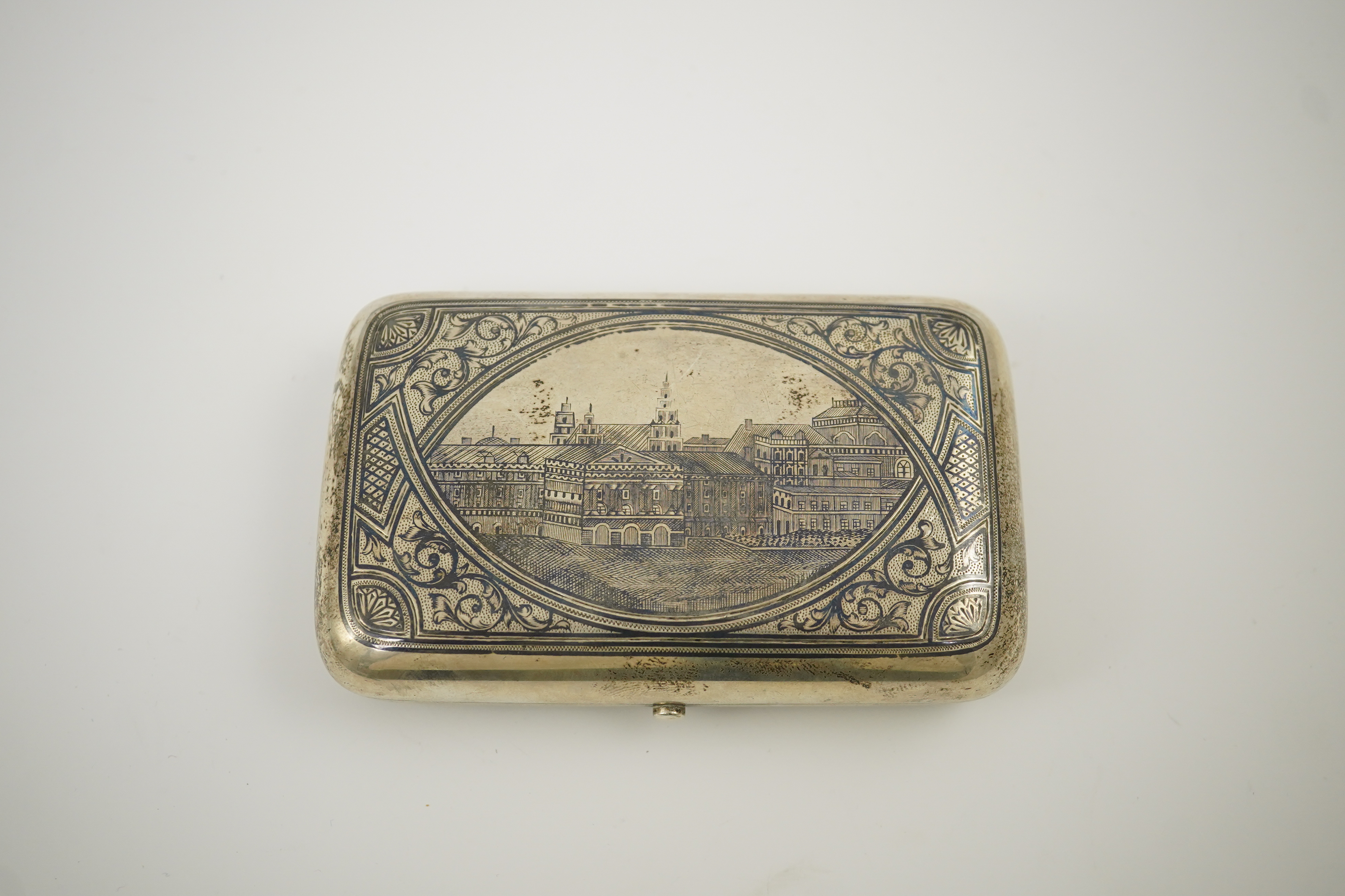 A late 19th century Russian 84 zolotnik and niello cigarette case, assay master A. Romanov, master Ivan F. Smirnov?